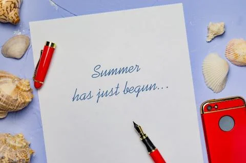 Background with seashells a white sheet of paper with the inscription pen red Stock Photos