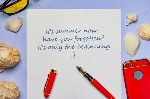 Background with seashells a white sheet of paper with the inscription pen red Stock Photos