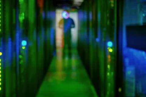 Background of server lights and silhouette of a man, artificial intelligence  Stock Photos