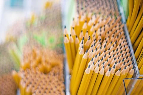 Background of sharpened yellow pencils. Back to school Stock Photos
