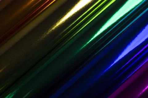 Background of sheets of bright shiny multi-colored foil in rolls Stock-Fotos