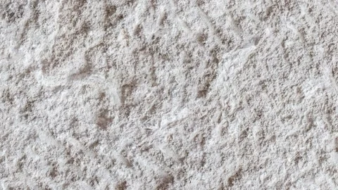 Background, shell stone with chopped traces of pickaxe, rotating 스톡 동영상 255036155