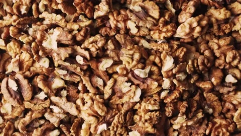 Background of shelled walnuts, slow rotation. Stock Footage 165719812