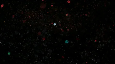 Background of shining glitter particles and sparks. Stockbeeldmateriaal 219980291