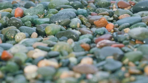 Background Of Shiny Pebbles On The River Shore. Nautical Background. Wet Stones 스톡 동영상 259846694