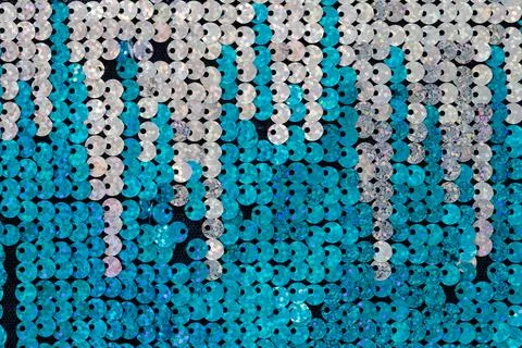 Background, silver and blue sequins material macro, close-up, top view, flatl Foto stock