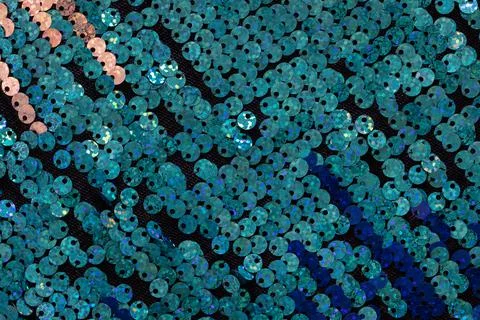 Background, silver and blue sequins material macro, close-up, top view, flatl Foto stock