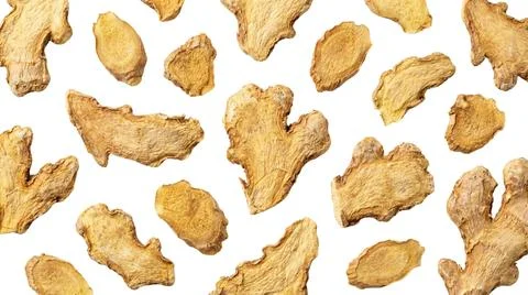 Background of sliced dried ginger, scattered pattern, natural spice for cul.. Фото
