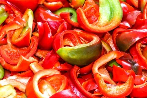 Background from sliced peppers Stock Photos