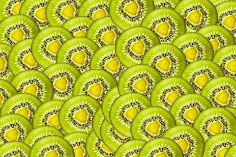 Background is of sliced thin slivers of kiwi Stock Illustration