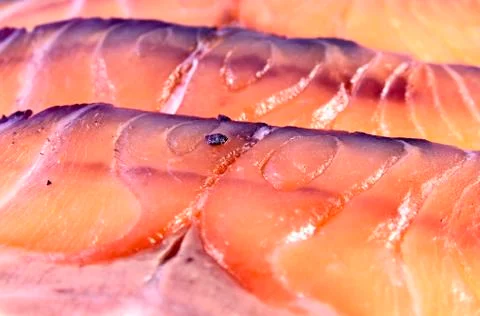 Background from slices of salmon Stock Photos