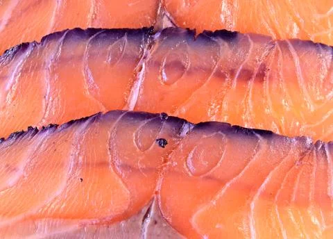 Background from slices of salmon Stock Photos