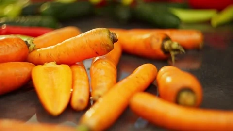 Background slow motion carrot on the table close-up. Stock Footage 296362381