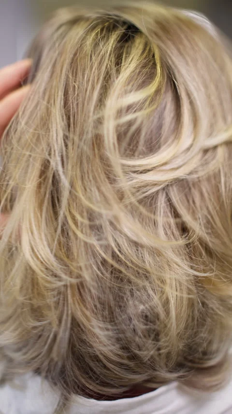 Background slow motion video of blonde hair developing Video stock 336159993