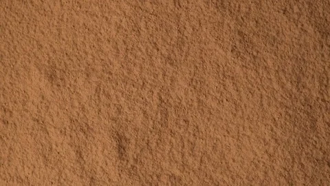 Background slow rotation cocoa powder top view. Stock Footage 293462179