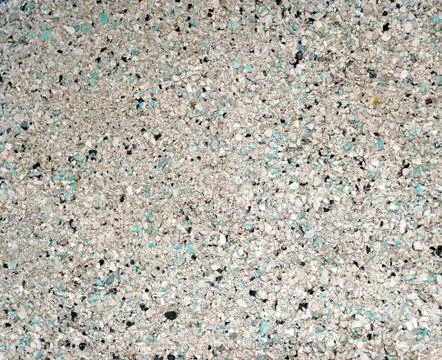 Background of small blue, gray, white and black small granules (filler cat li Stock Photos