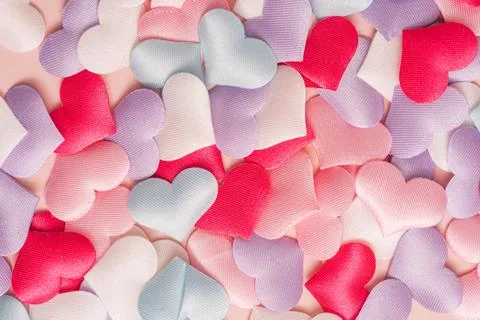 Background of small multi-colored hearts Foto stock