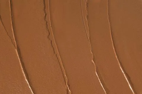 Background with smooth melted chocolate  Stock Photos