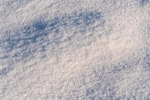 Background of snow texture in warm tone Foto stock