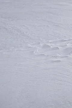 Background of the snow texture with waves. Stock Photos