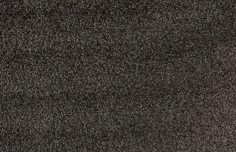 Background of soft black polyester fabric with wet asphalt texture Stock Photos