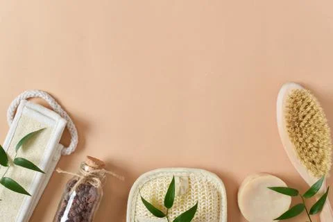 Background of spa accessories on beige background. Natural cosmetics. Stock Photos