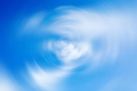 Background with spin radial blur effect of blue cloudy sky 스톡 사진