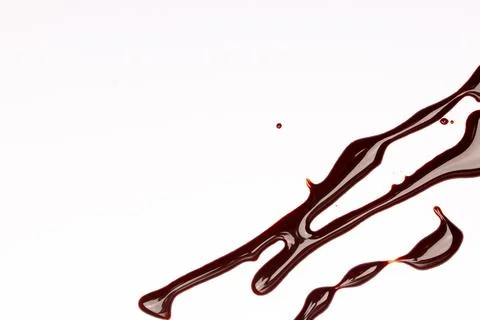 Background of splash and flow drops of chocolate Stock Photos