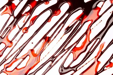 Background of splash and flow drops of chocolate Stock Photos