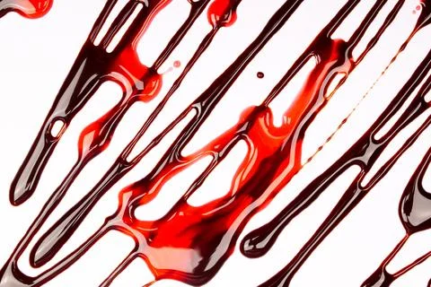 Background of splash and flow drops of chocolate Stock Photos