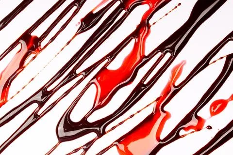 Background of splash and flow drops of chocolate Stock Photos