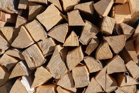 Background from stack of firewood from birch tree, for heating house, stacked Stock Photos