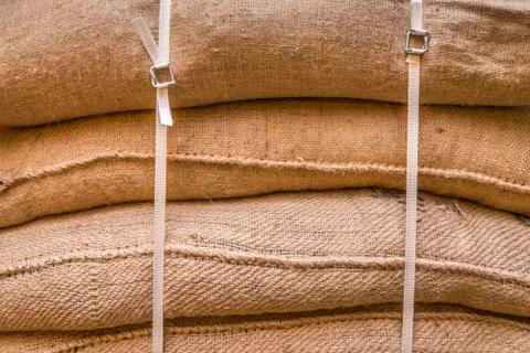 Background of stacked burlap sacks Stock Photos