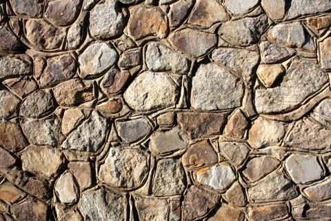 Background - Stacked Stone Wall. Stock Photos
