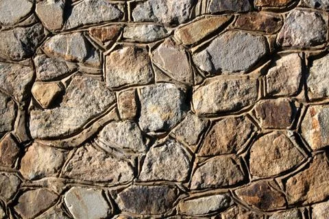 Background - Stacked Stone Wall. Stock Photos