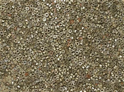 Background of steel nuts of the same size. Stock-Fotos