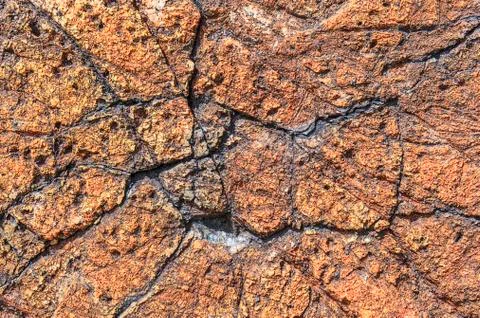 The background stone is brown in the cracks Stock Photos
