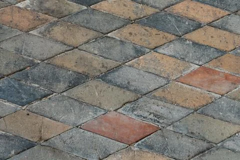 Background stone from multicolored tiles square light and dark pattern Stock Photos