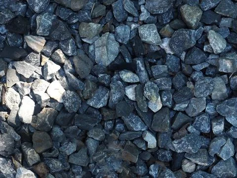 Background of stone pebbles. Texture of stone pebbles. Stock Photos