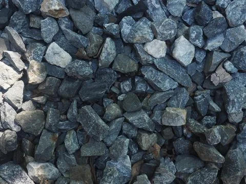Background of stone pebbles. Texture of stone pebbles. Stock Photos