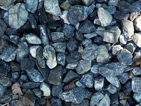 Background of stone pebbles. Texture of stone pebbles. Stock-Fotos