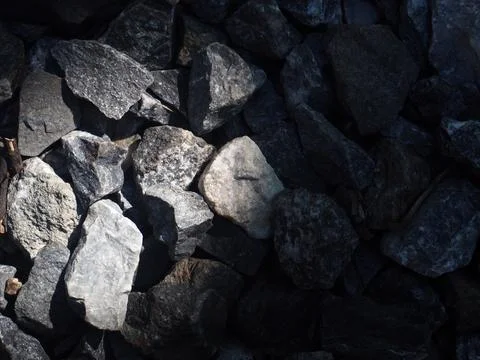 Background of stone pebbles. Texture of stone pebbles. Stock Photos