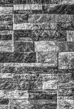 A background of stone wall in black and white Stock Photos