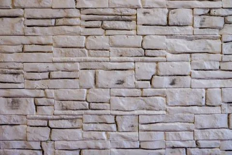 Background of stone wall made with blocks Stock Photos