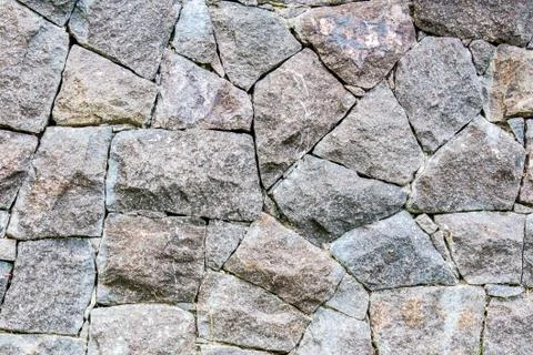 Background of a stone wall Stock Photos