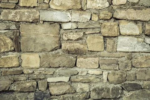 Background with stone wall Stock Photos