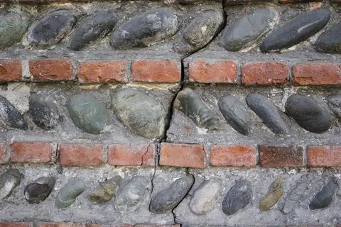 Background of stone wall texture with crack Stock Photos
