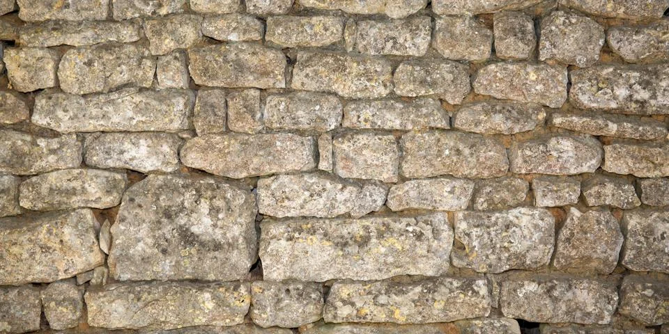Background stone wall texture gray coarse rectangular natural stones Foto stock