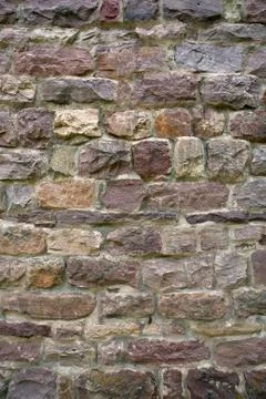 Background of stone wall texture Stock Photos