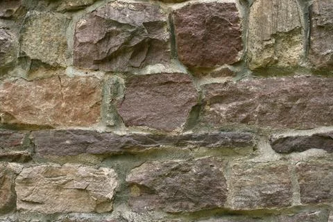 Background of stone wall texture Stock Photos